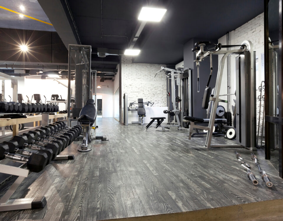 Modern gym interior with various equipment