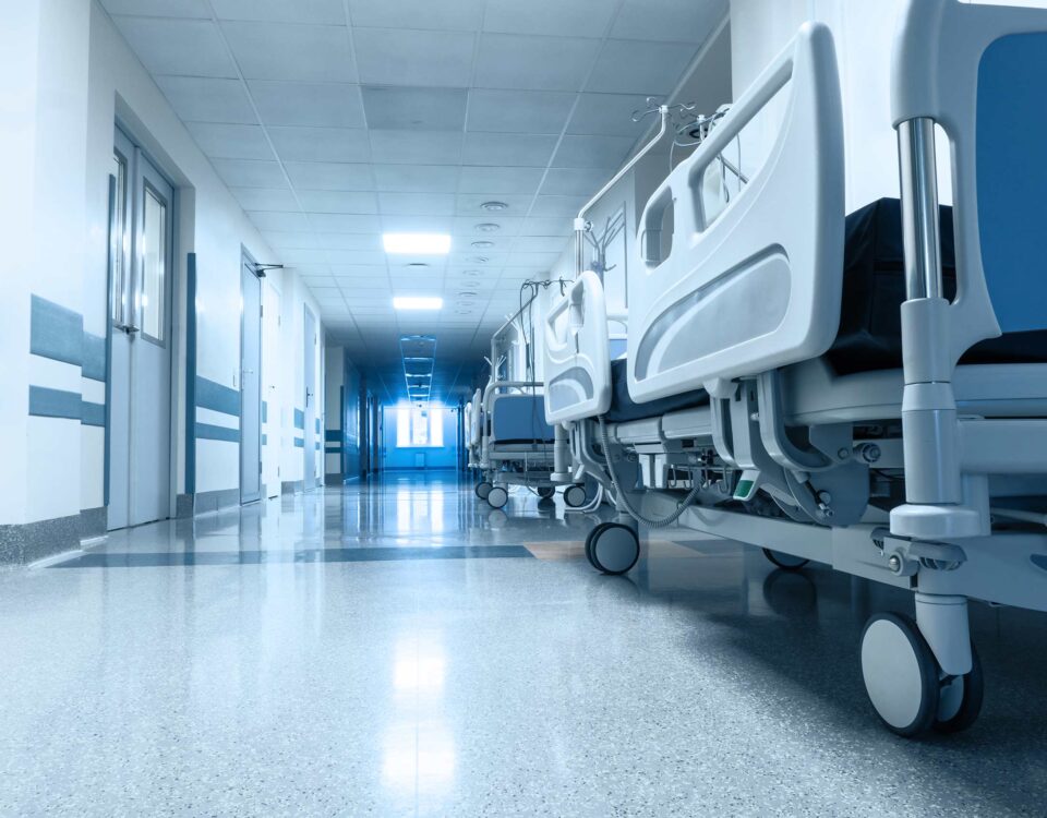 Long corridor in hospital with surgical transport.