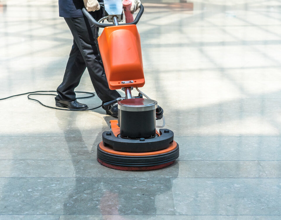 cleaning floor with machine