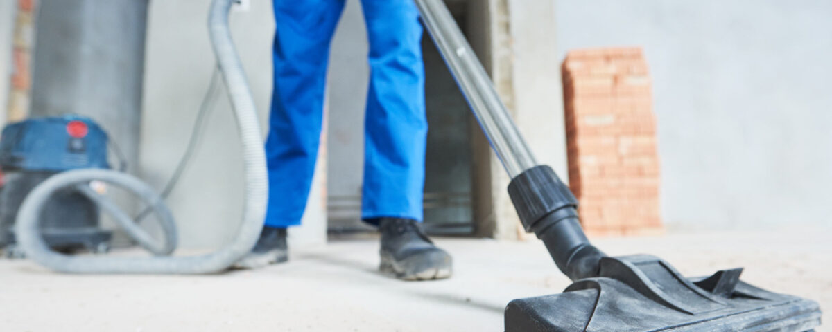 construction cleaning service. dust removal with vacuum cleaner