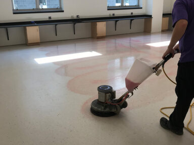 Application Scher Flooring Services applying VCT finish