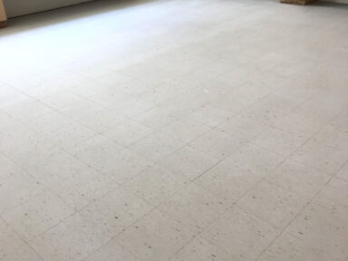 Stripped Scher Flooring Services after applying VCT finish