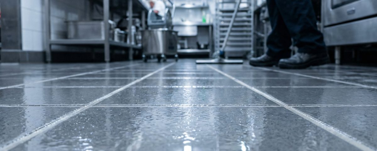 Professional kitchen cleaning services | Industrial wet floor safety tiles | Commercial restaurant kitchen maintenance | Deep cleaning commercial floors
